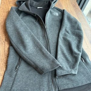 Women’s Northface, grey zip up jacket w/hood.